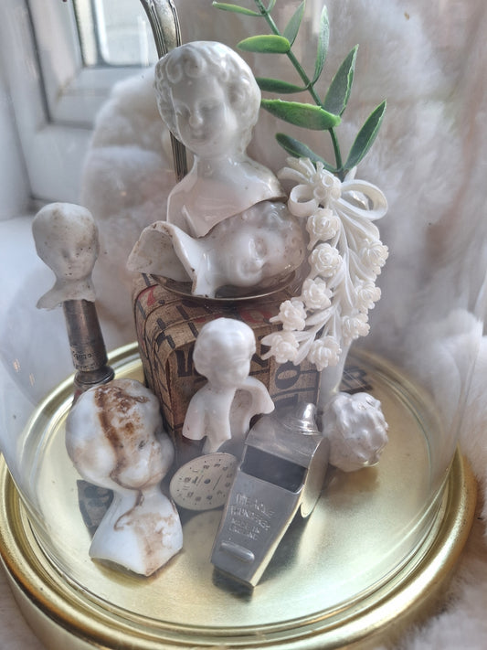 Antique frozen charlotte under glass dome