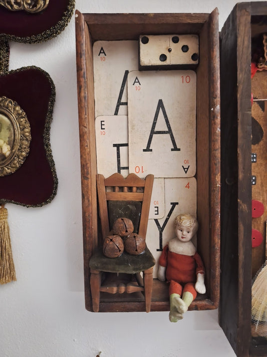 Antique doll wooden box display